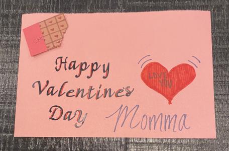 A card reading "Happy Valentine's Day Mama"