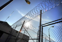 In this Jan. 5, 2012 photo, razor wire tops the fencing at the Polunsky Unit prison in Livingston, Texas. ( Bob Owen/Houston Chronicle via AP)